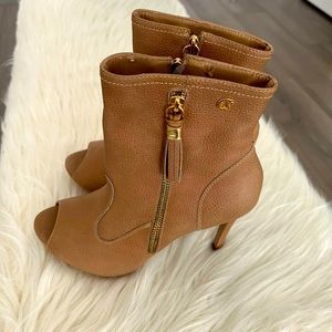 Brand new pair leather heeled boots, high quality leather. Never used